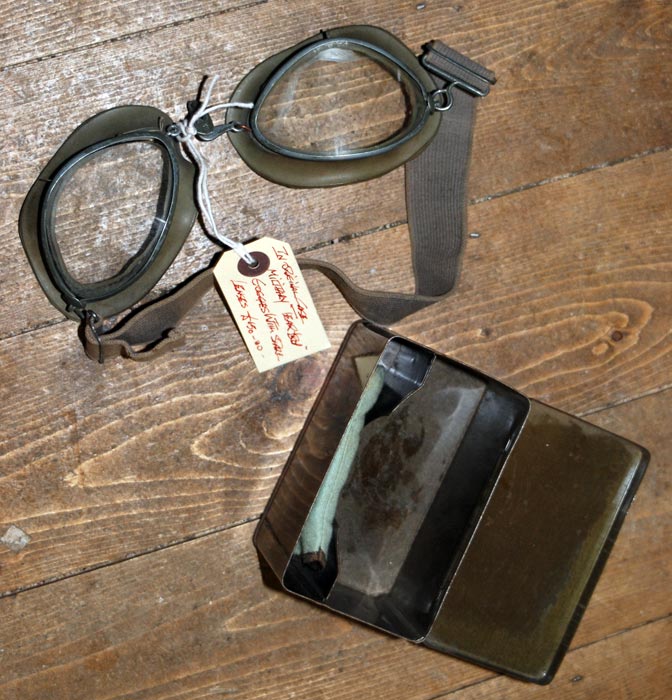 This is an interesting piece. It's a pair of aircrew goggles, probably of WW2 German origin.It comes with its original metal case and a pair of spare lenses in a soft bag. There's very slight discolou